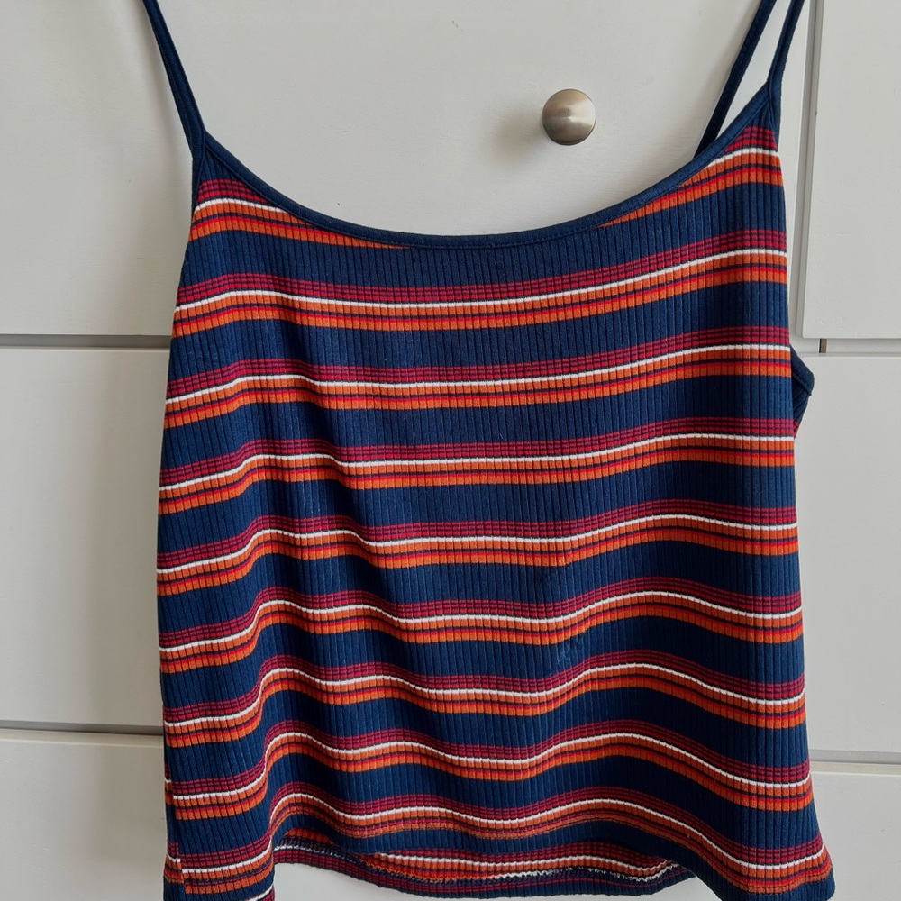 Forever 21 stripped tank top in the colors blue, red, and orange in a size M